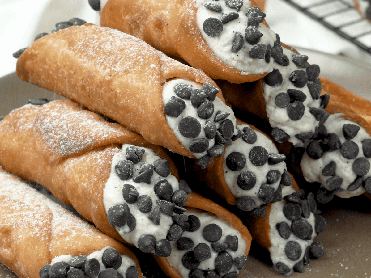 Traditional cannoli filled with sweet ricotta cream